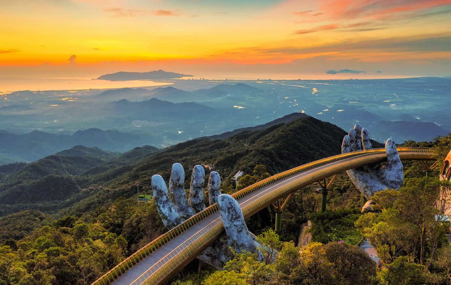 Top 12 best things to do in Da Nang - Visit Golden Bridge on Ba Na Hills